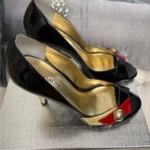 Black Patent Peep-Toe Heels with Red Accent and Gold Heel